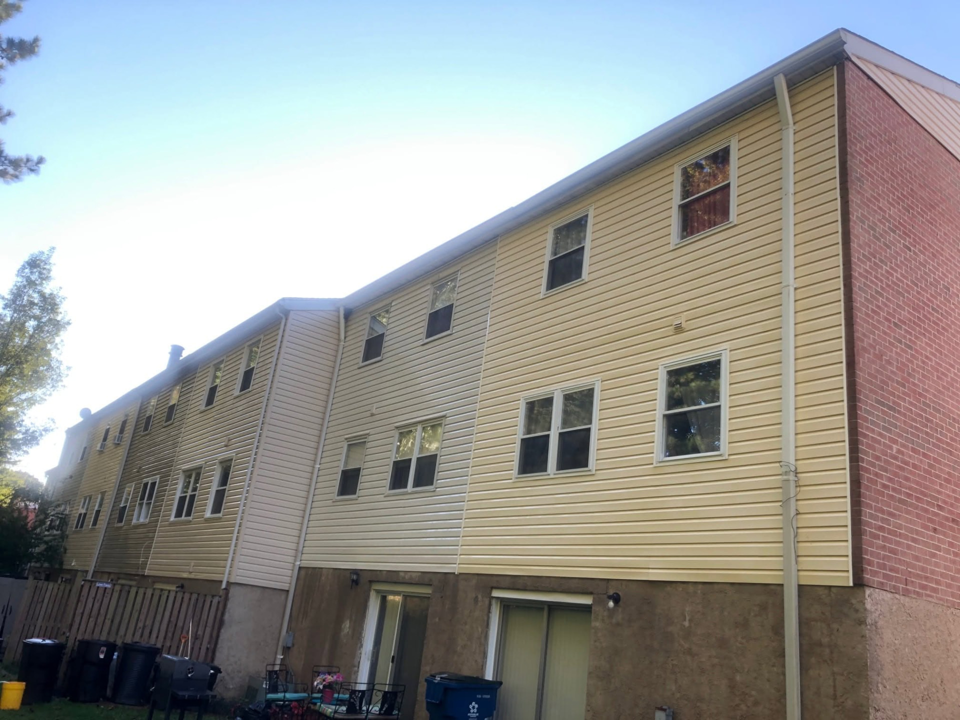 Bright yellow siding after washing